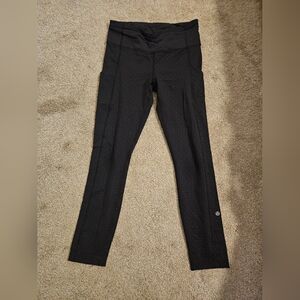 Lululemon High-Waisted Black Leggings with Subtle Print